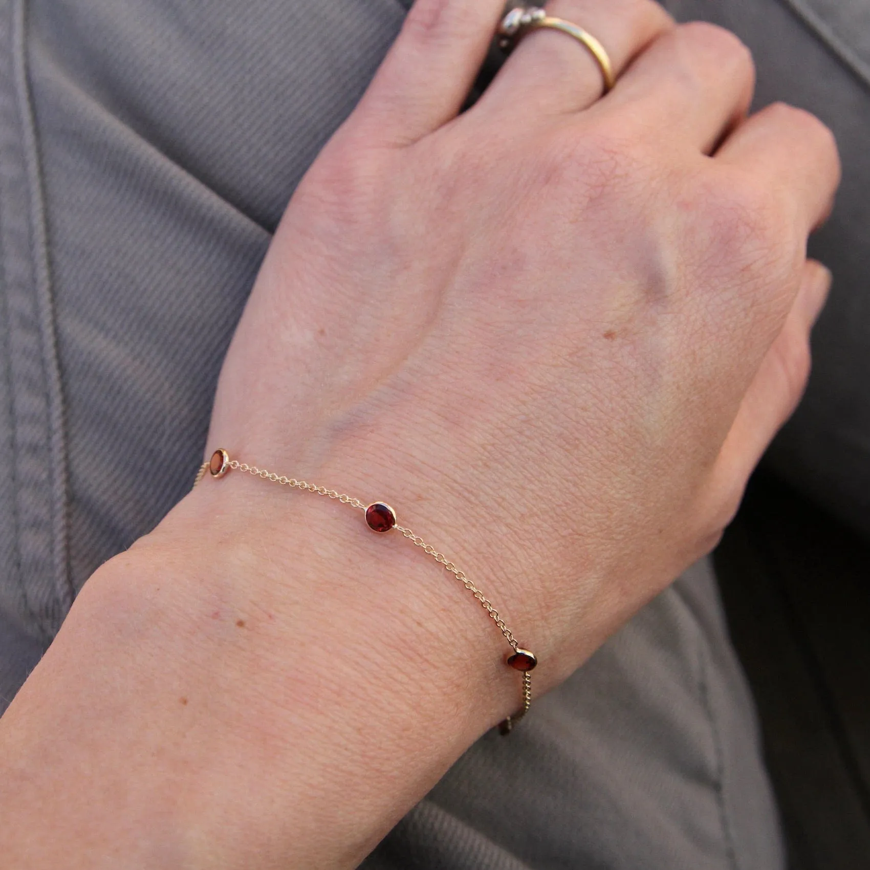 14k Garnet Station Bracelet