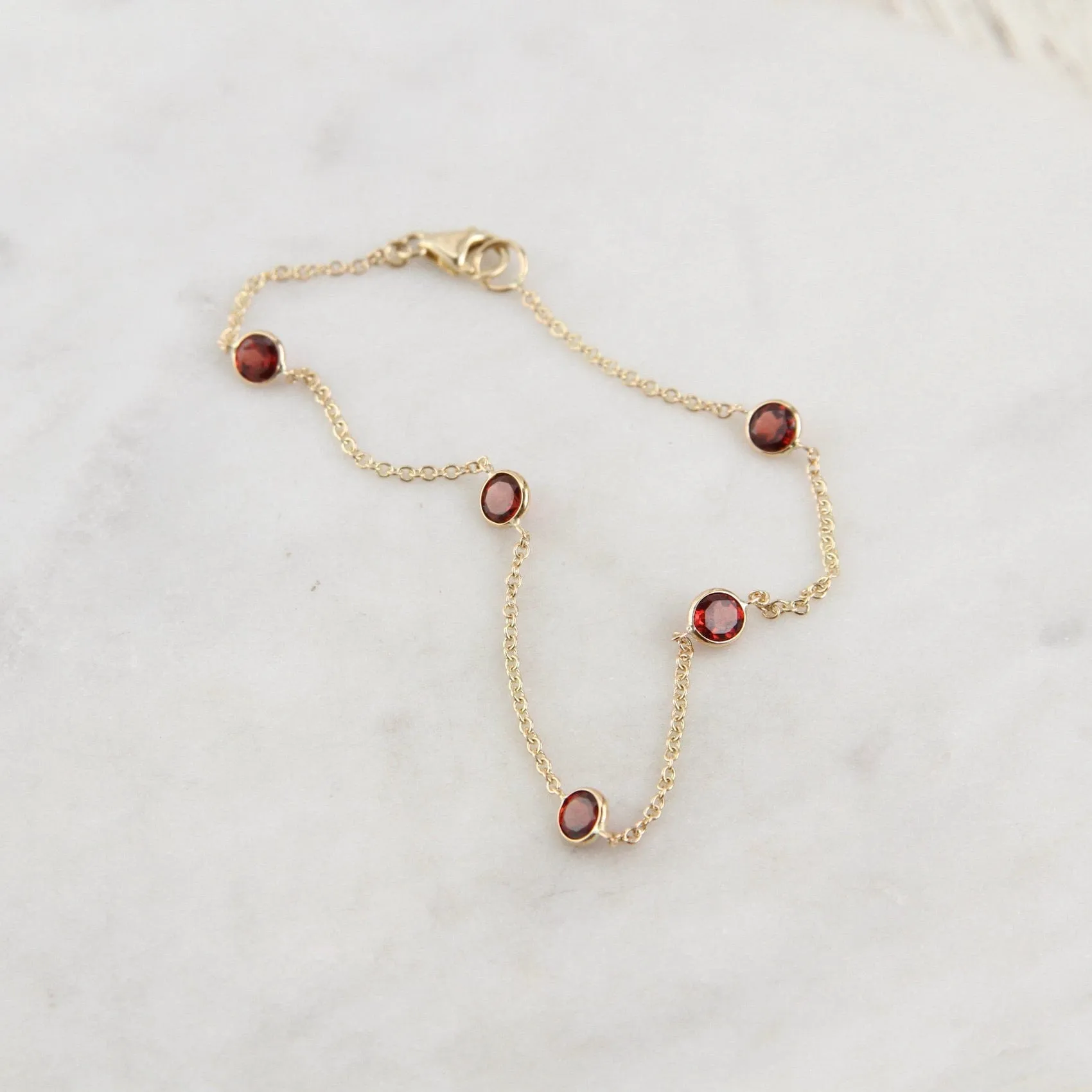 14k Garnet Station Bracelet